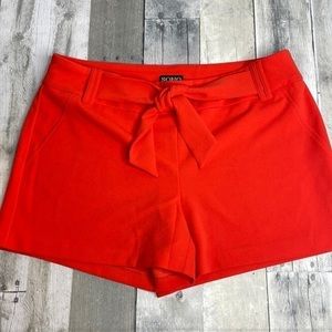 𝅺SOHO orange colored shorts.  Faux pockets and belt. 4” inseam. Size large. EUC